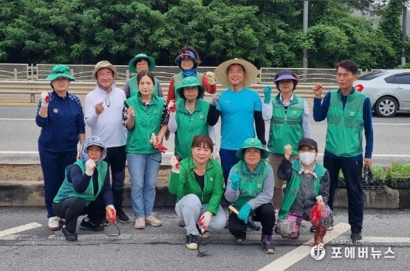 관고동 새마을 남∙여 협의회, 도로변 화단 꽃길 조성