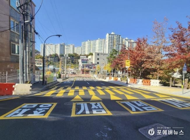 용인특례시 마북동 교동마을 현대홈타운 정문 앞 우회전 전용차로 확장